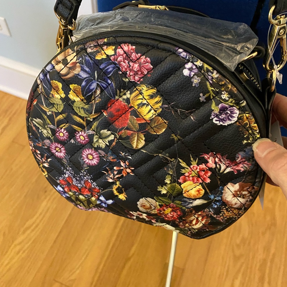 Inc brand small round black crossbody purse with floral design